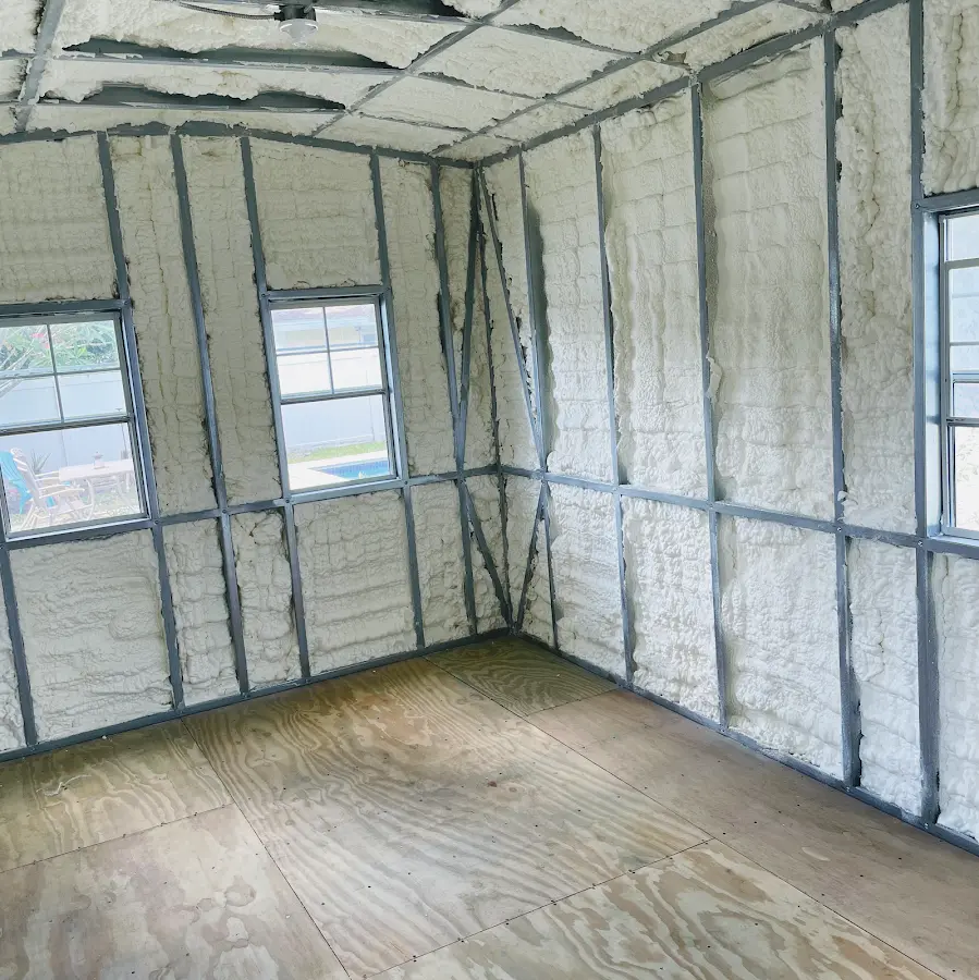 Closed-cell spray foam insulation applied to wall cavities in a residential project in Agawam Town